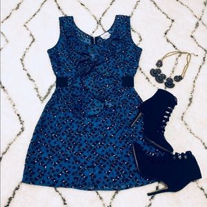 Summer mini dress with ruffles and heart pattern